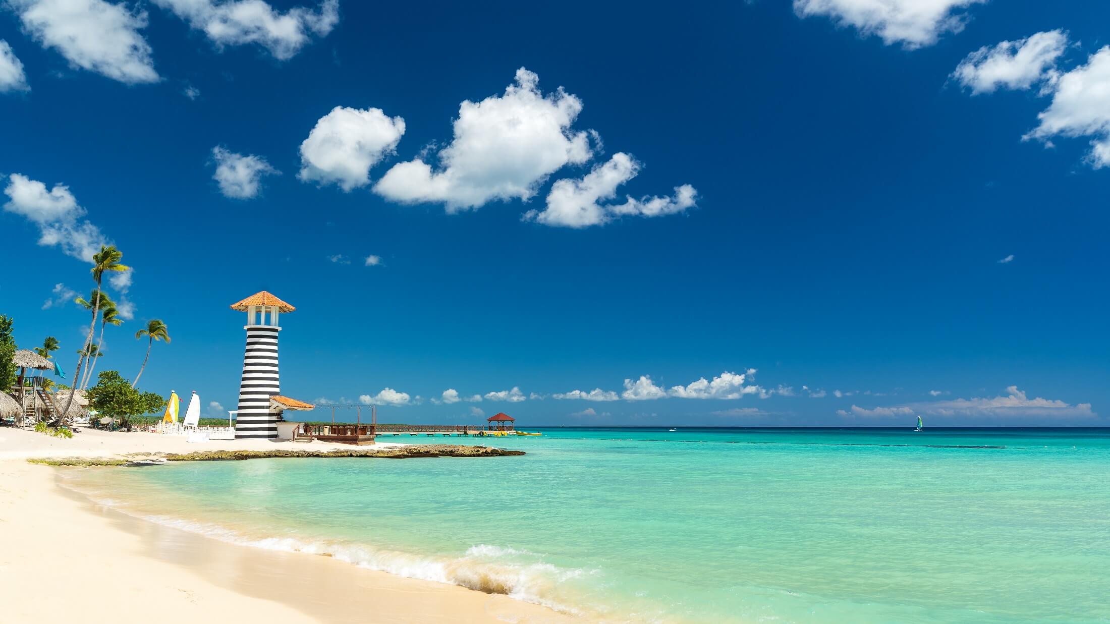 Lighthouse on the beach of the Caribbean, Dominican Republic, Bayahibe - Summer Vacation Concept