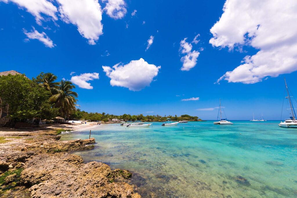 View of the stony beach in Bayahibe, La Altagracia, Dominican Republic. Copy space for text