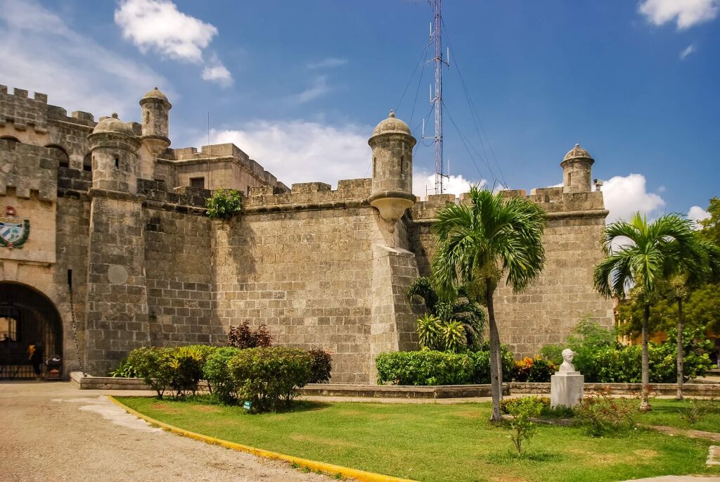Fortaleza de San Carlos de la Cabana (Fort of Saint Charles) is 18th-century fortress complex, located on elevated eastern side of harbor entrance in Havana, Cuba. It rises above hilltop, Morro Castle