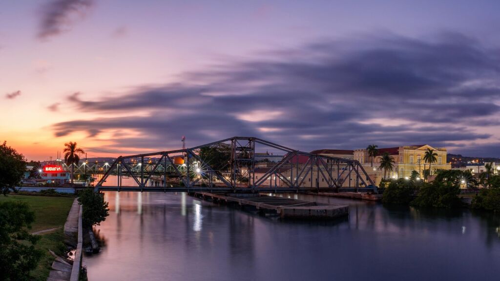The Swing Bridge on the San Juan river in Matanzas, Cuba at sunset