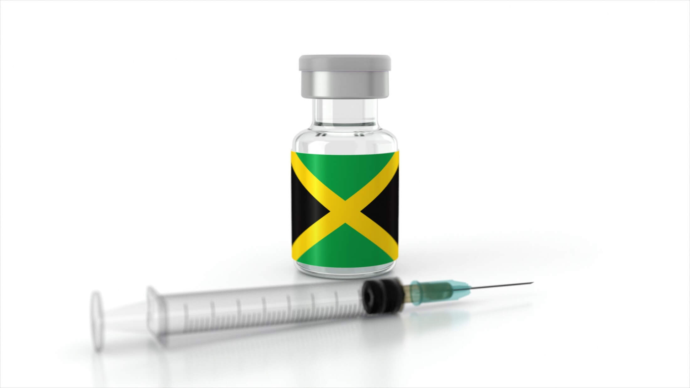 Vaccine Bottles and Syringe isolated on White Background. Healthcare and medical concepts. Coronavirus Vaccine with the flag of Jamaica. Covid vaccination campaign concept in Jamaica.