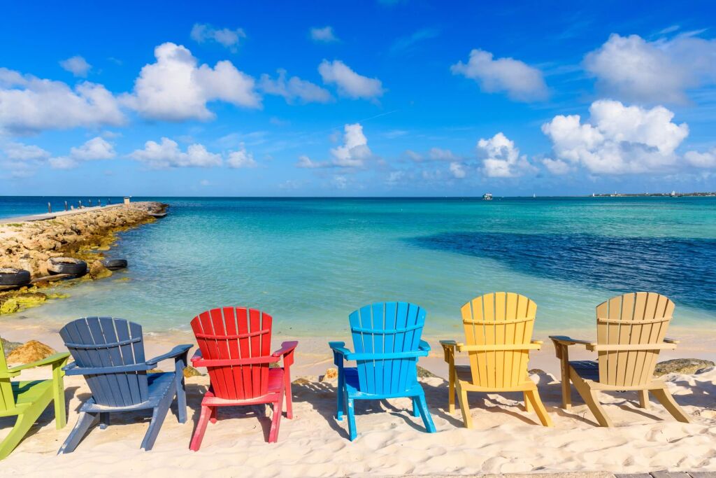 Colorful chairs near the shore of the beautiful Eagle Beach in Aruba