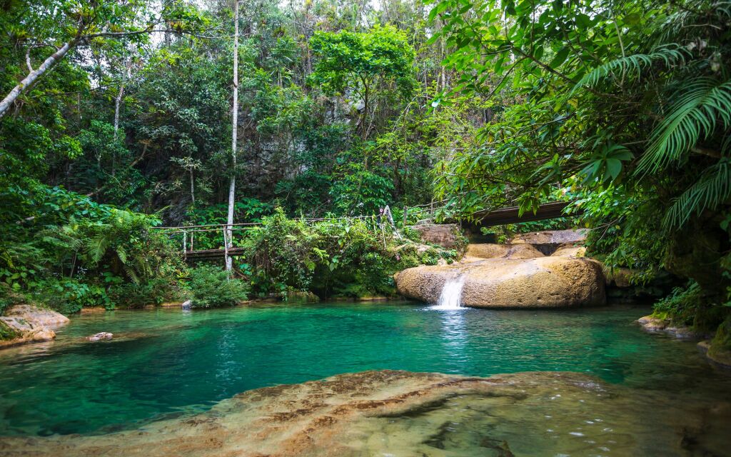 El Nicho waterfall, located in the Sierra del Escambray mountains not far from Cienfuegos, Cuba, West Indies, Caribbean, Central America