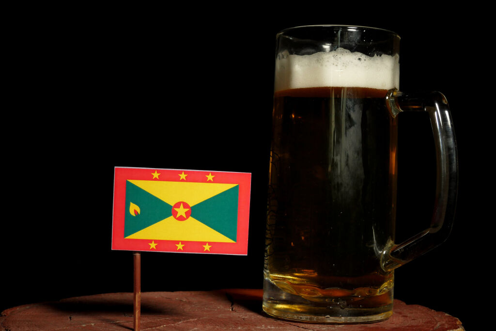 Grenada flag with beer mug isolated on black background